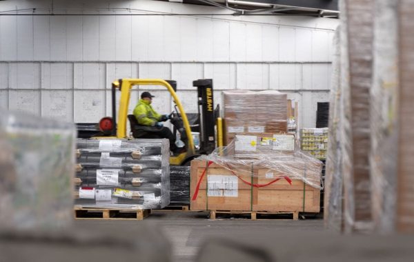 A forklift driver moving pallets in the Cumbernauld Warehouse.