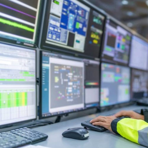 Engineer working at control room,Manager control system,Technician man monitoring program from a lot of monitor Engineer working at control room,Manager control system,Technician man monitoring program from a lot of monitor